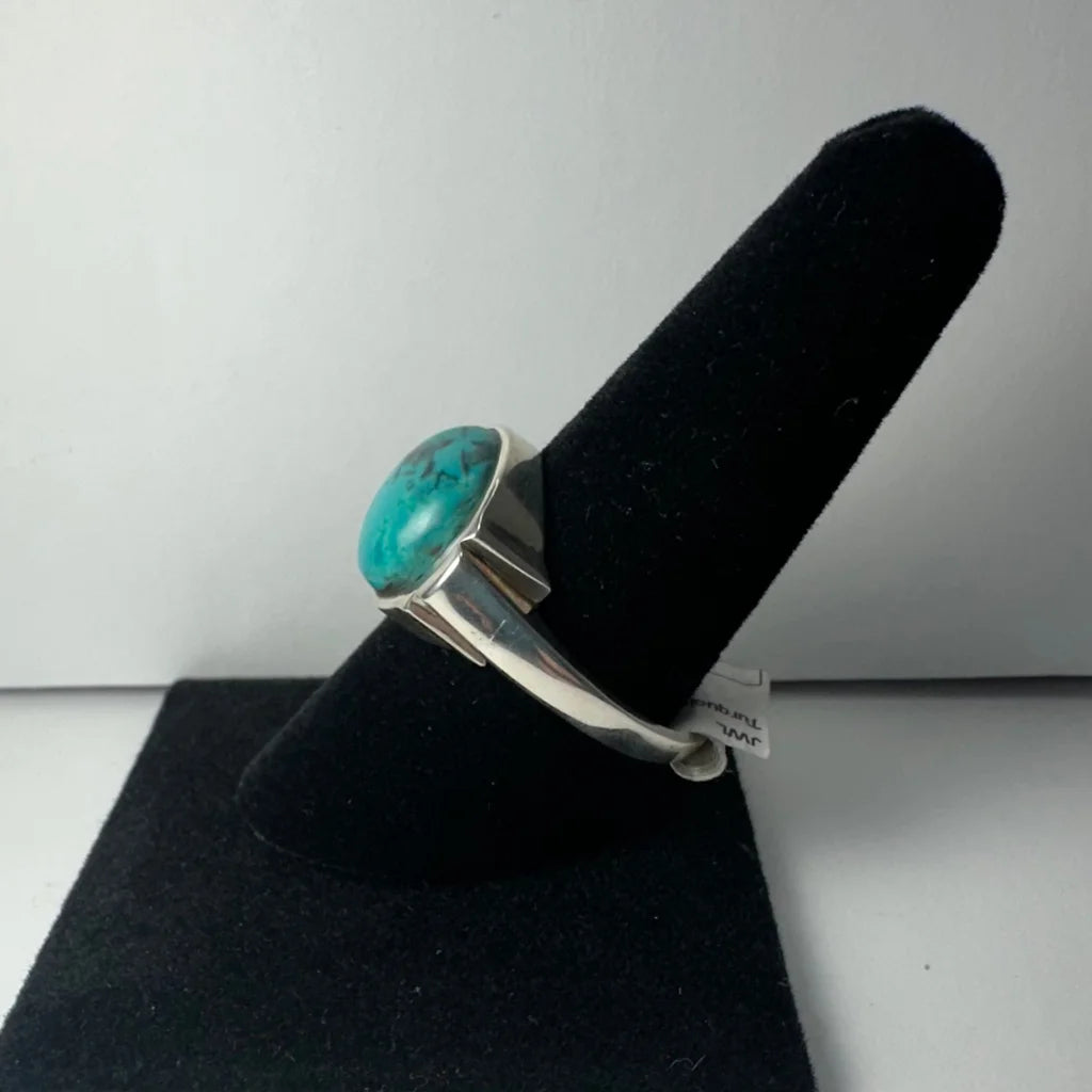 Stunning silver turquoise ring with oval matrix stone