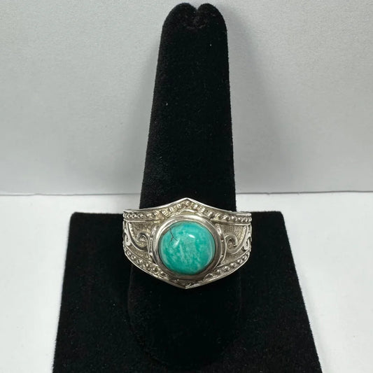 Stunning silver turquoise ring with ornate beaded band and round stone