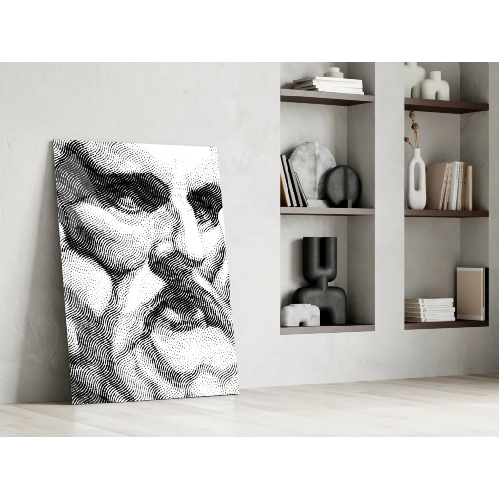 Black and white stippled face portrait canvas wall art leaning on wall