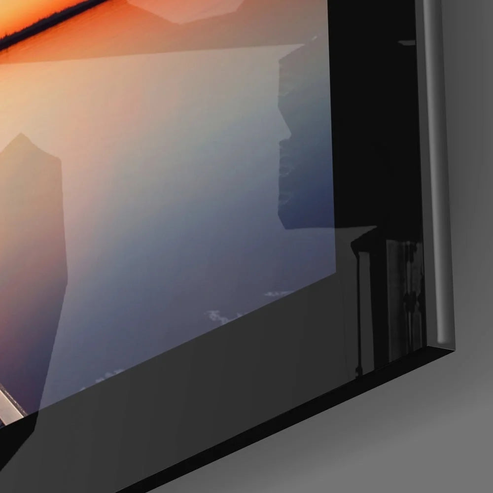 Sleek black flat-screen TV on stunning sunset glass wall art with birds