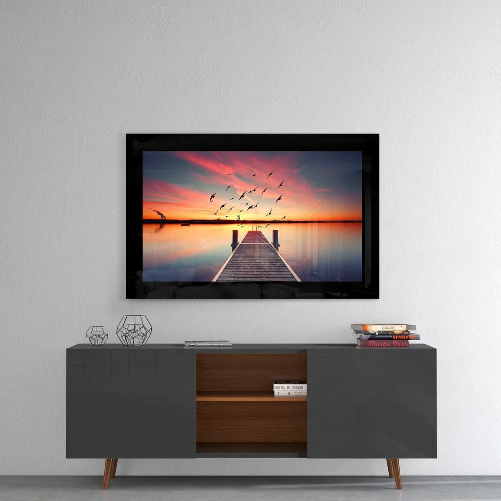 Stunning Sunset glass wall art with flying birds on 4K smart TV