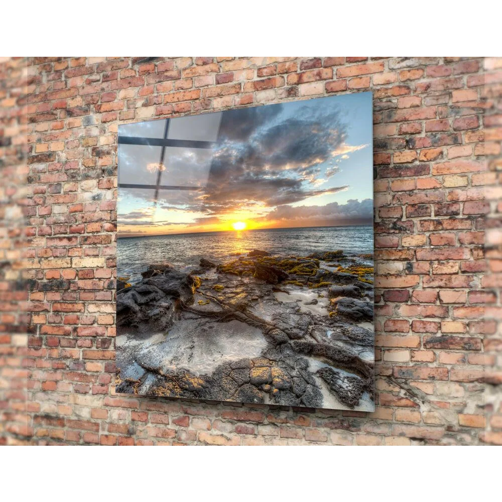 Stunning sunset glass wall art over rocky shoreline