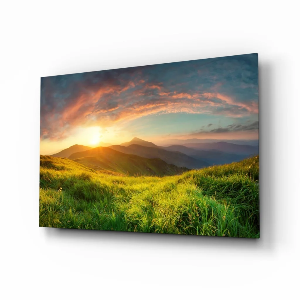 Vibrant sunset glass wall art over rolling green hills