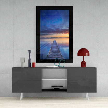 Modern gray TV stand with white legs and open storage for glass wall art