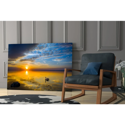Serene sunset swan canvas wall art in vibrant blue orange hues