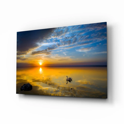 Serene sunset canvas wall art with swan, rock, vibrant ocean colors