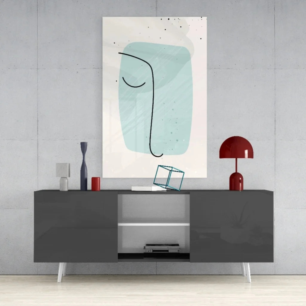 Stunning teal abstract face glass wall art on white canvas