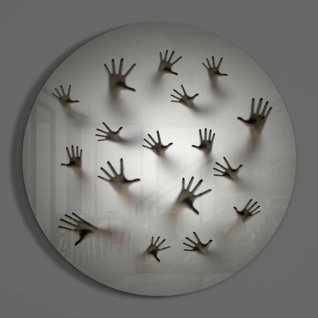 Stunning tempered glass art: white circular wall with bold black handprints