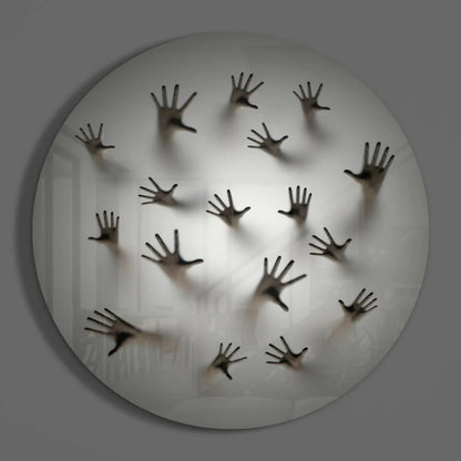 Stunning tempered glass art: white circular wall with bold black handprints