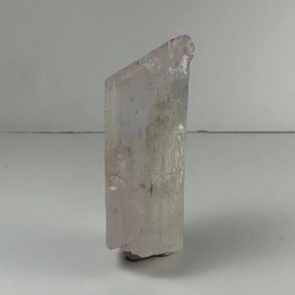 Stunning terminated pink spodumene kunzite crystal with translucent pale pink hue