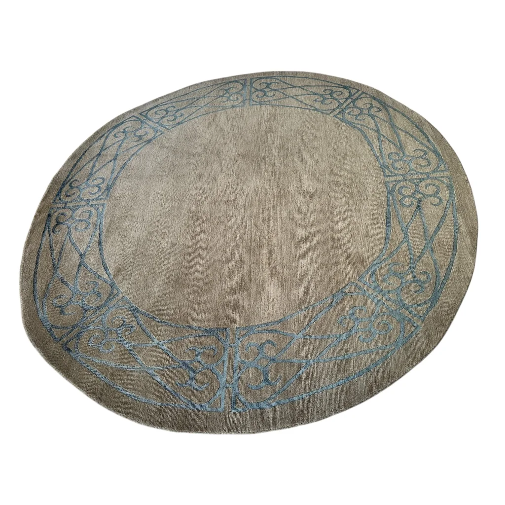 Stunning Tibetan rug with circular beige design and blue border
