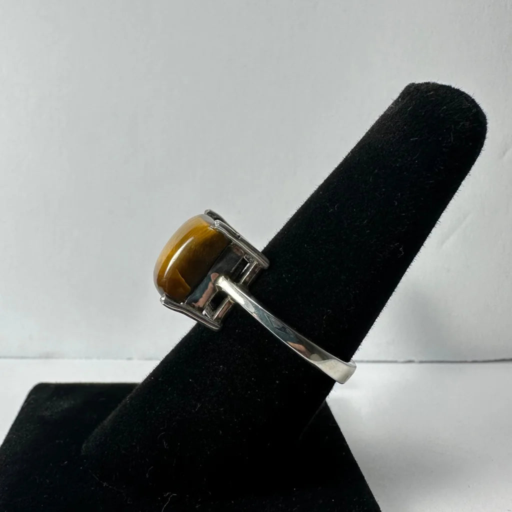 Stunning tiger eye ring in sleek silver band with oval stone