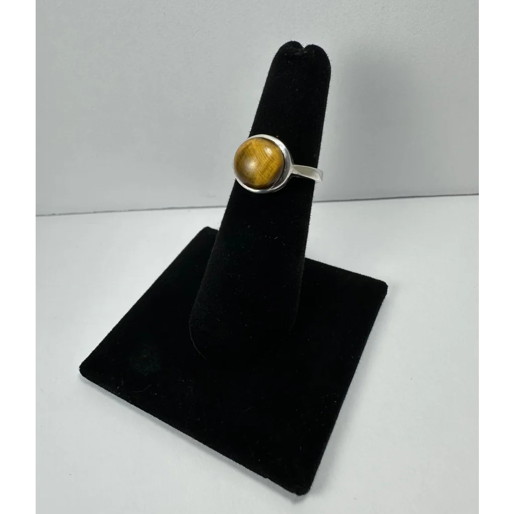 Sleek sterling silver tiger eye ring with golden-brown stone