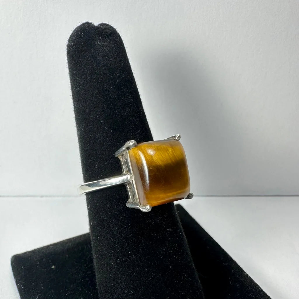 Stunning silver tiger eye ring with square golden stone