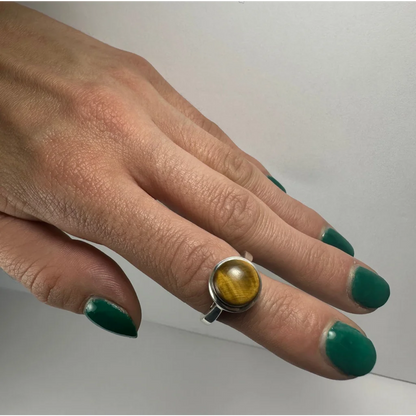Stunning tiger eye ring in sterling silver with golden bezel