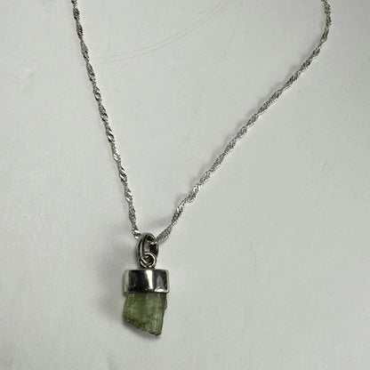Stunning tourmaline pendant in silver bezel with twisted chain
