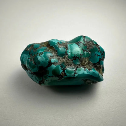 Vibrant turquoise nugget from Southwestern United States with glossy surface