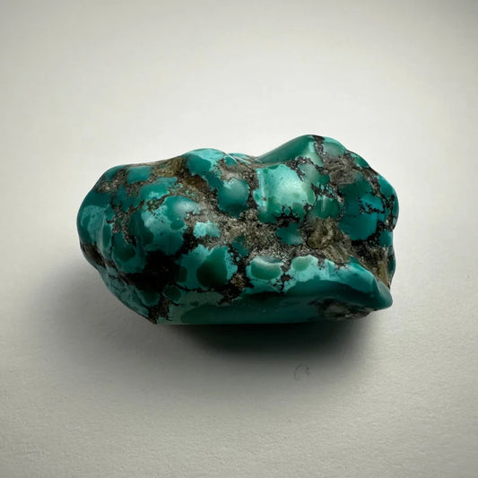 Vibrant turquoise nugget from Southwestern United States with glossy surface