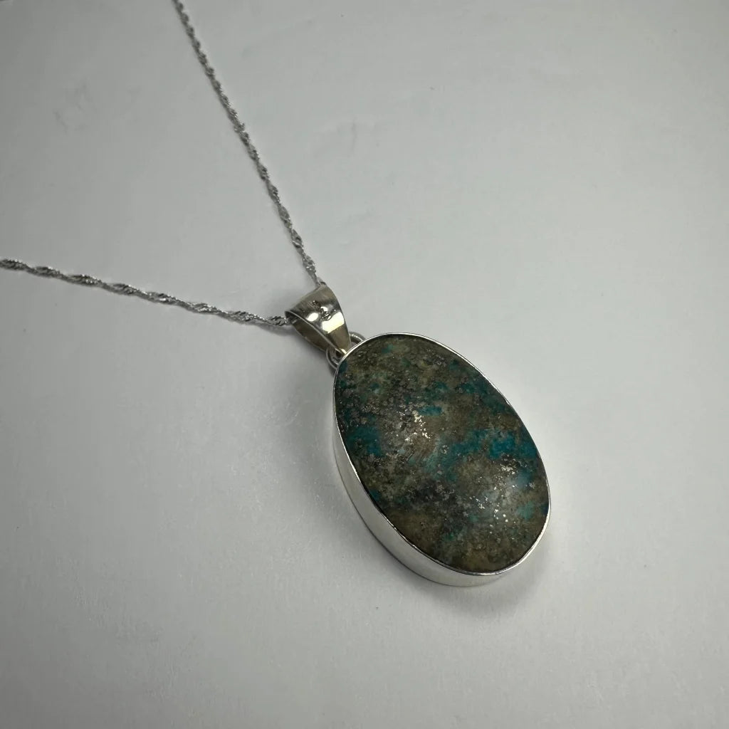 Stunning turquoise pendant in genuine sterling silver with oval stone