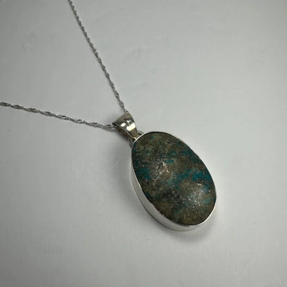 Stunning turquoise pendant in genuine sterling silver with oval stone