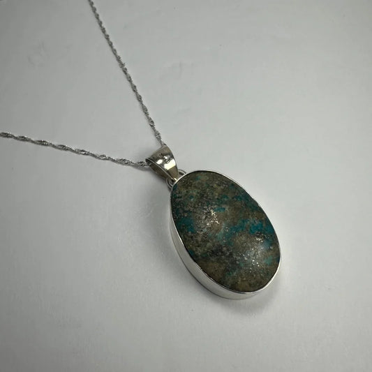 Stunning turquoise pendant in genuine sterling silver with oval stone
