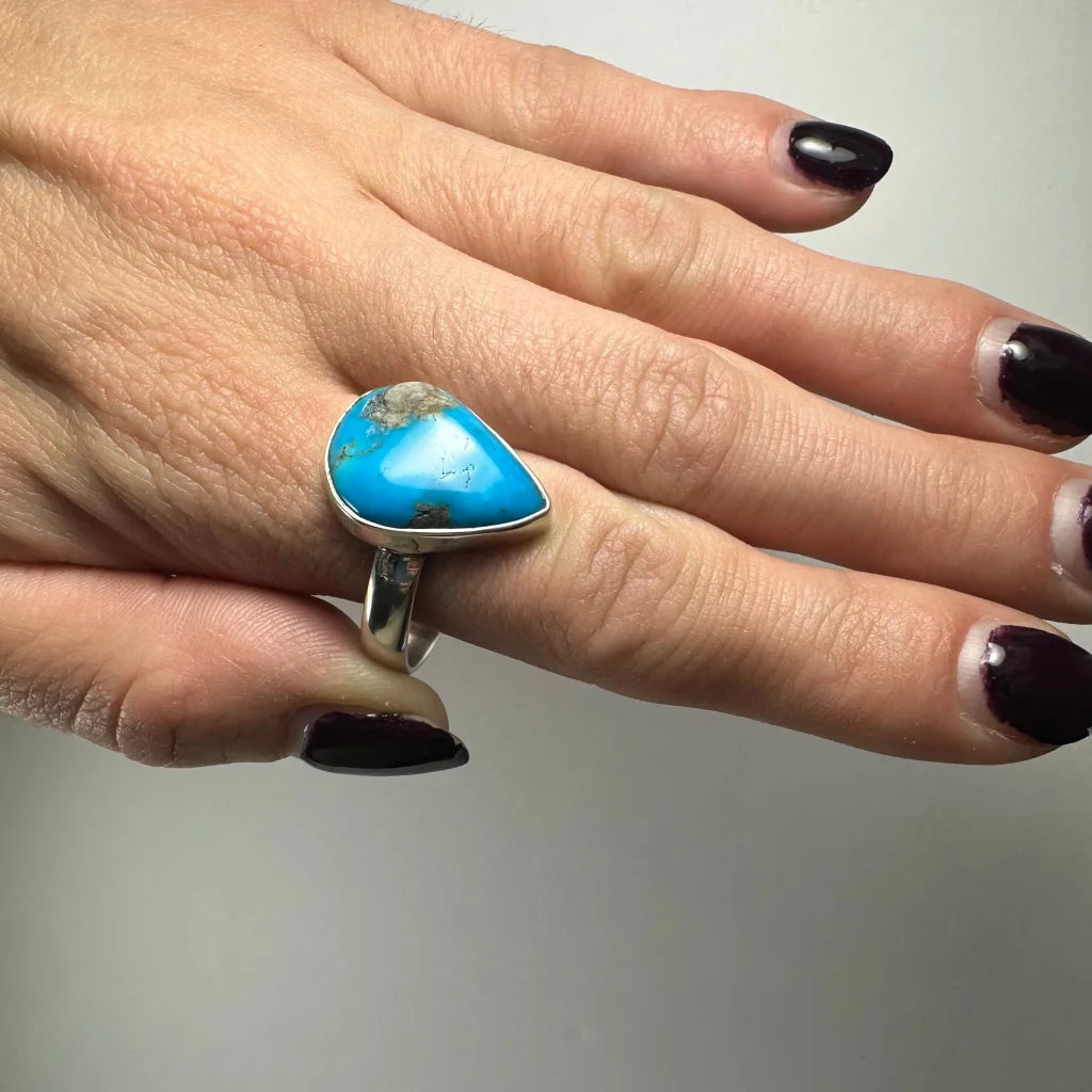 Stunning turquoise ring in sterling silver with natural matrix teardrop