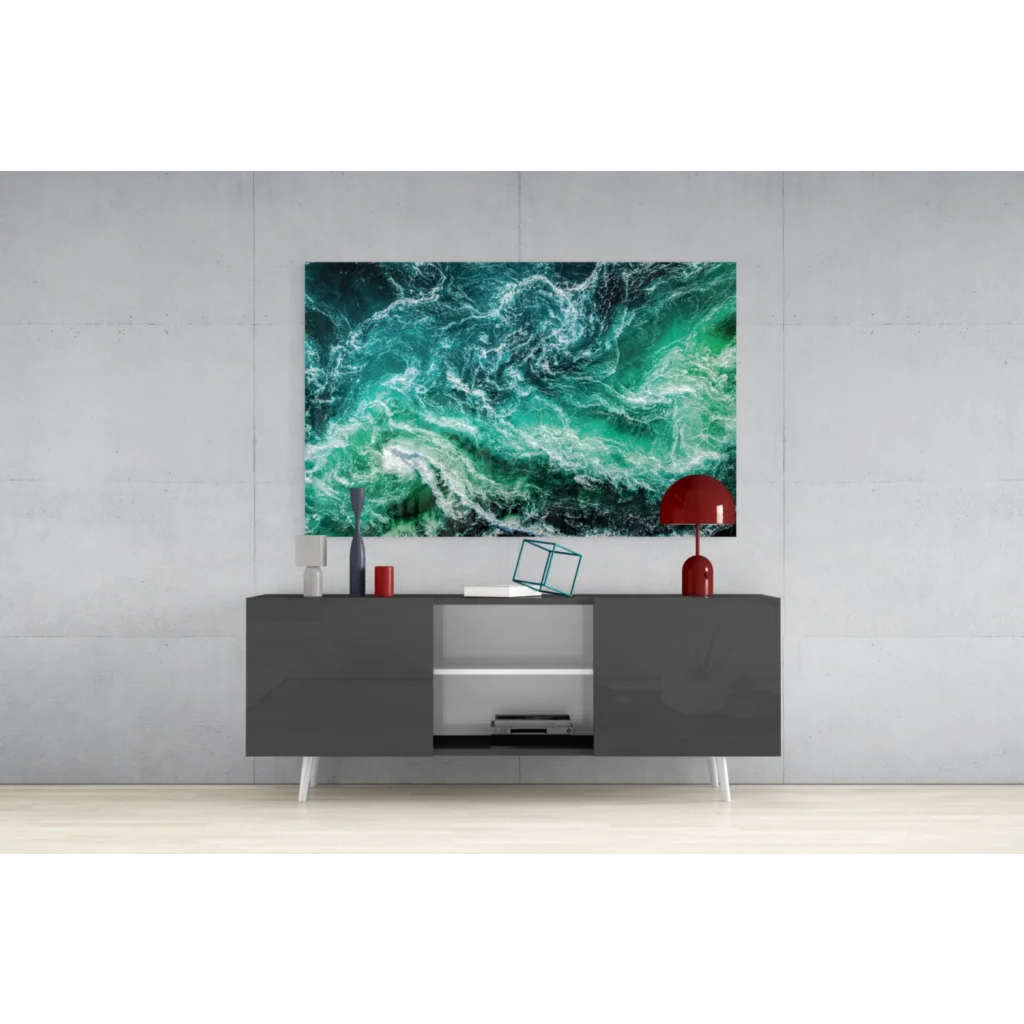 Stunning turquoise wave glass wall art above gray console