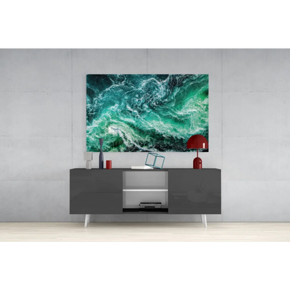 Stunning turquoise wave glass wall art above gray console