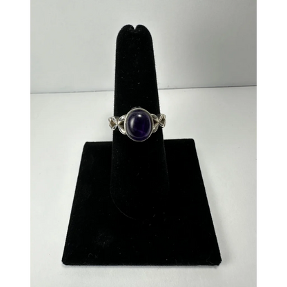 Stunning twisted silver amethyst ring with oval purple stone