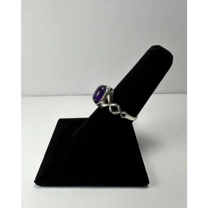 Stunning twisted silver amethyst ring with purple oval gemstone