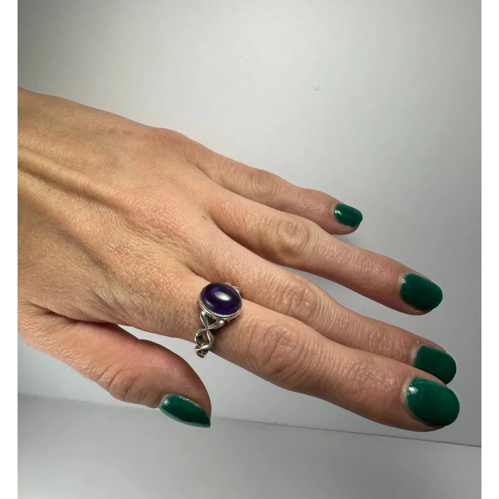 Stunning twisted silver amethyst ring with oval purple stone
