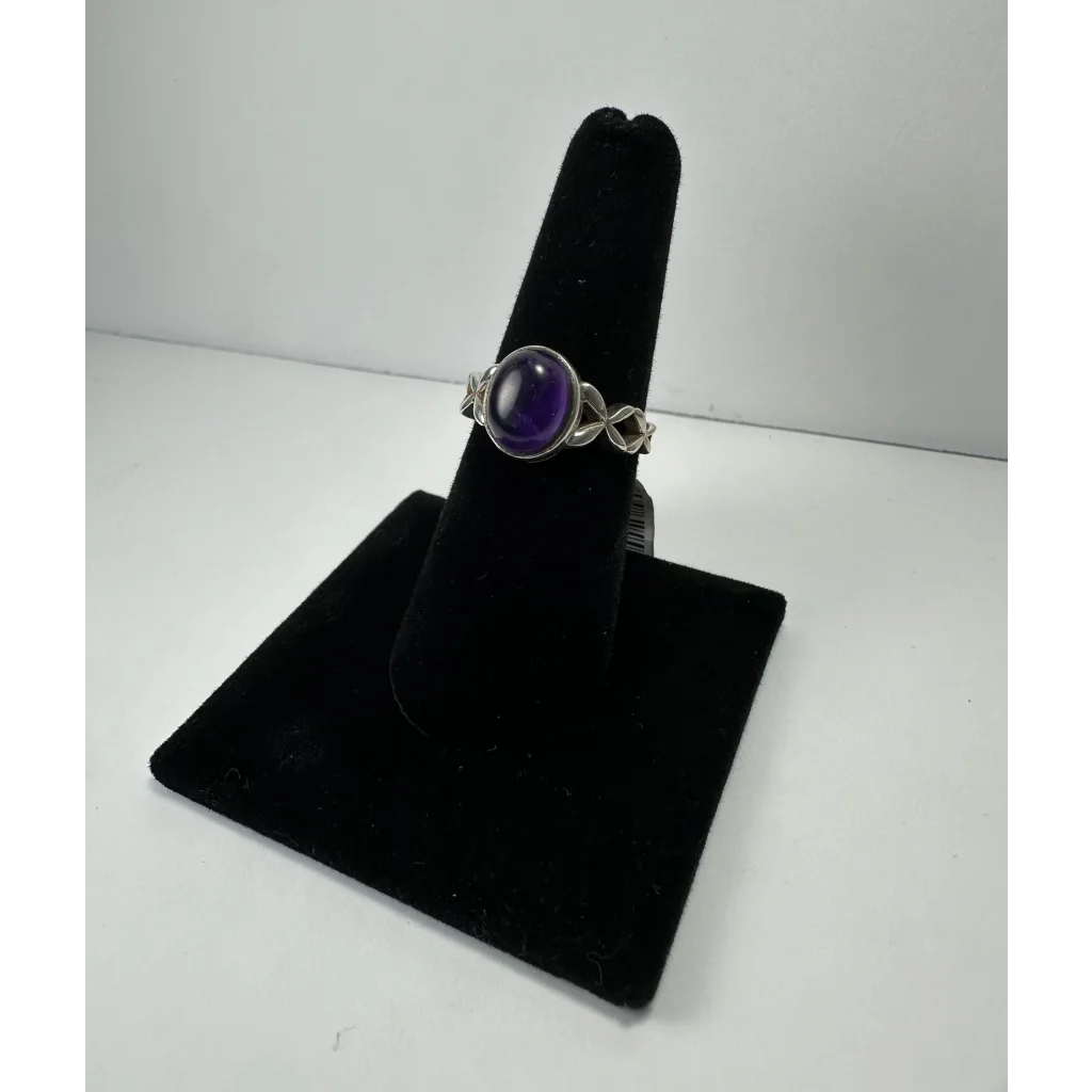 Stunning twisted silver amethyst ring with oval purple stone