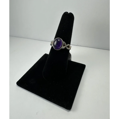Stunning twisted silver amethyst ring with oval purple stone