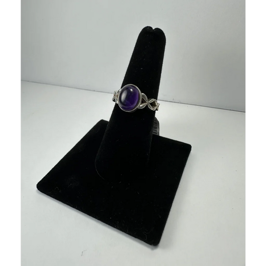 Stunning twisted silver amethyst ring with oval purple stone
