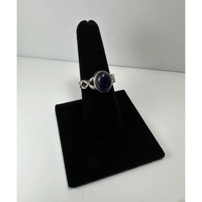Stunning twisted silver amethyst ring with purple oval cabochon stone