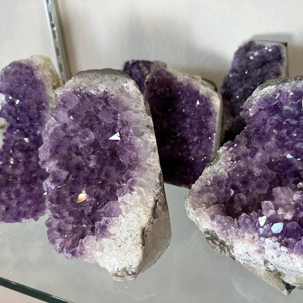 Stunning Uruguay amethyst geode with cut base and purple crystals