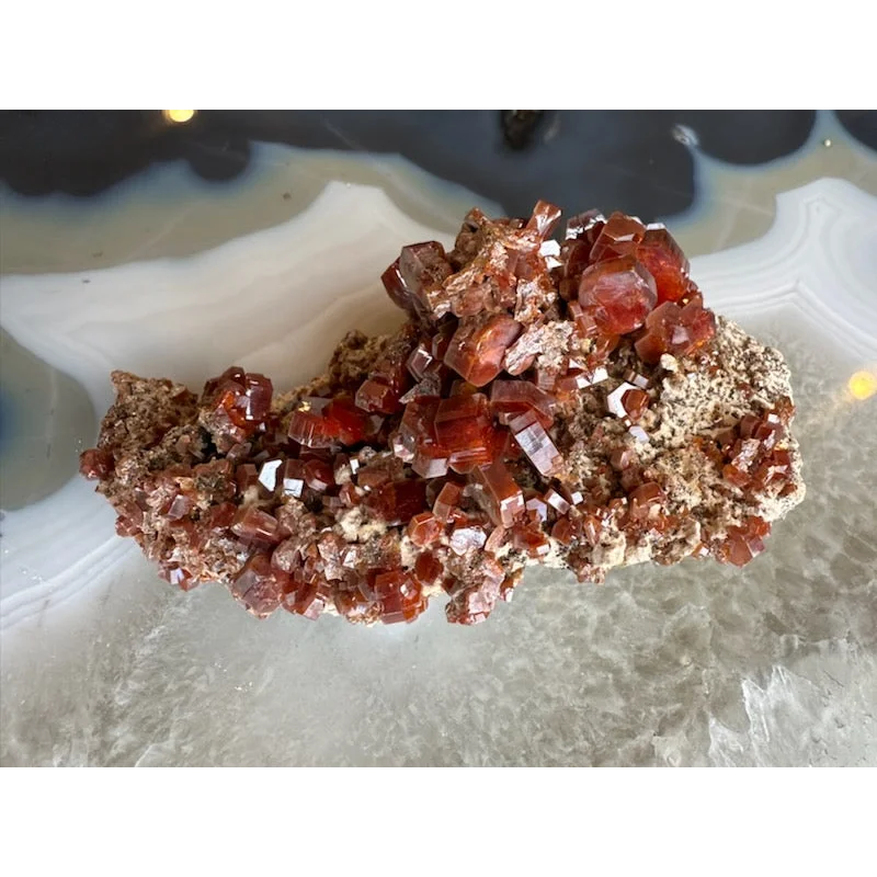 Vibrant red vanadinite cluster from Mibladen, Morocco