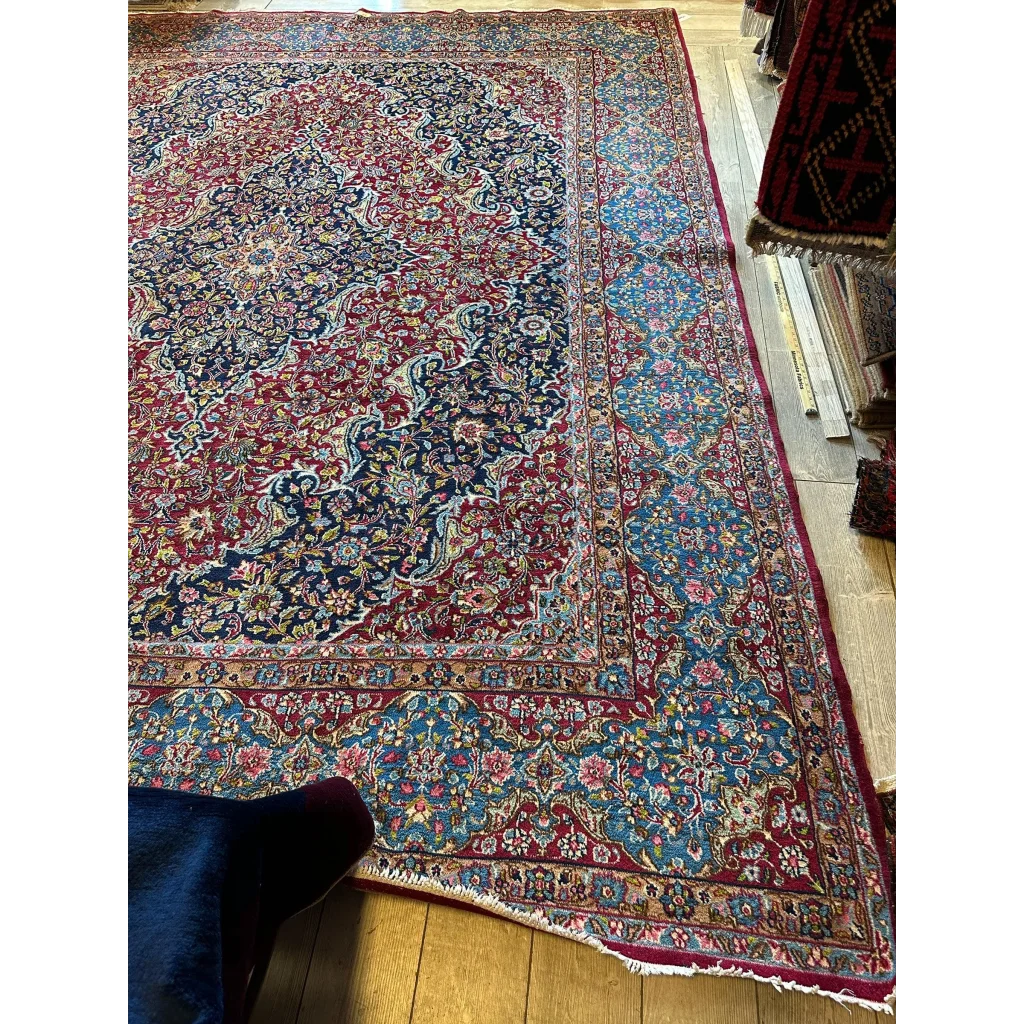 Stunning vintage fine Persian rug with central medallion in red, navy, turquoise, gold