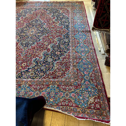 Stunning vintage fine Persian rug with central medallion in red, navy, turquoise, gold