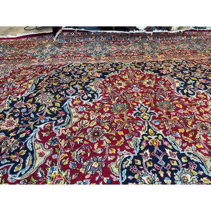 Vibrant vintage fine Persian rug with red navy medallion floral design