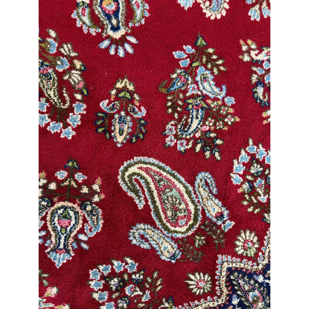 Vintage Kirman Persian rug in rich crimson with paisley floral motifs