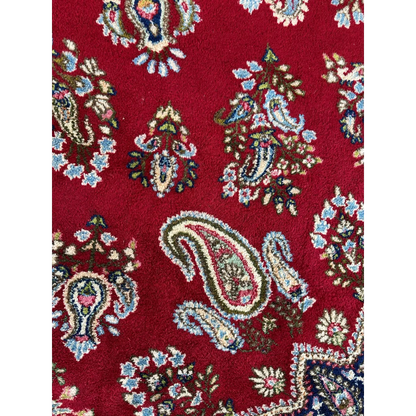 Vintage Kirman Persian rug in rich crimson with paisley floral motifs