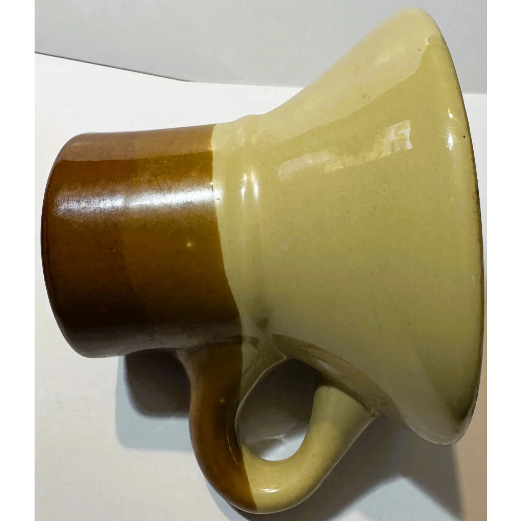 Vintage mid century studio pottery mug with two-tone brown and beige design