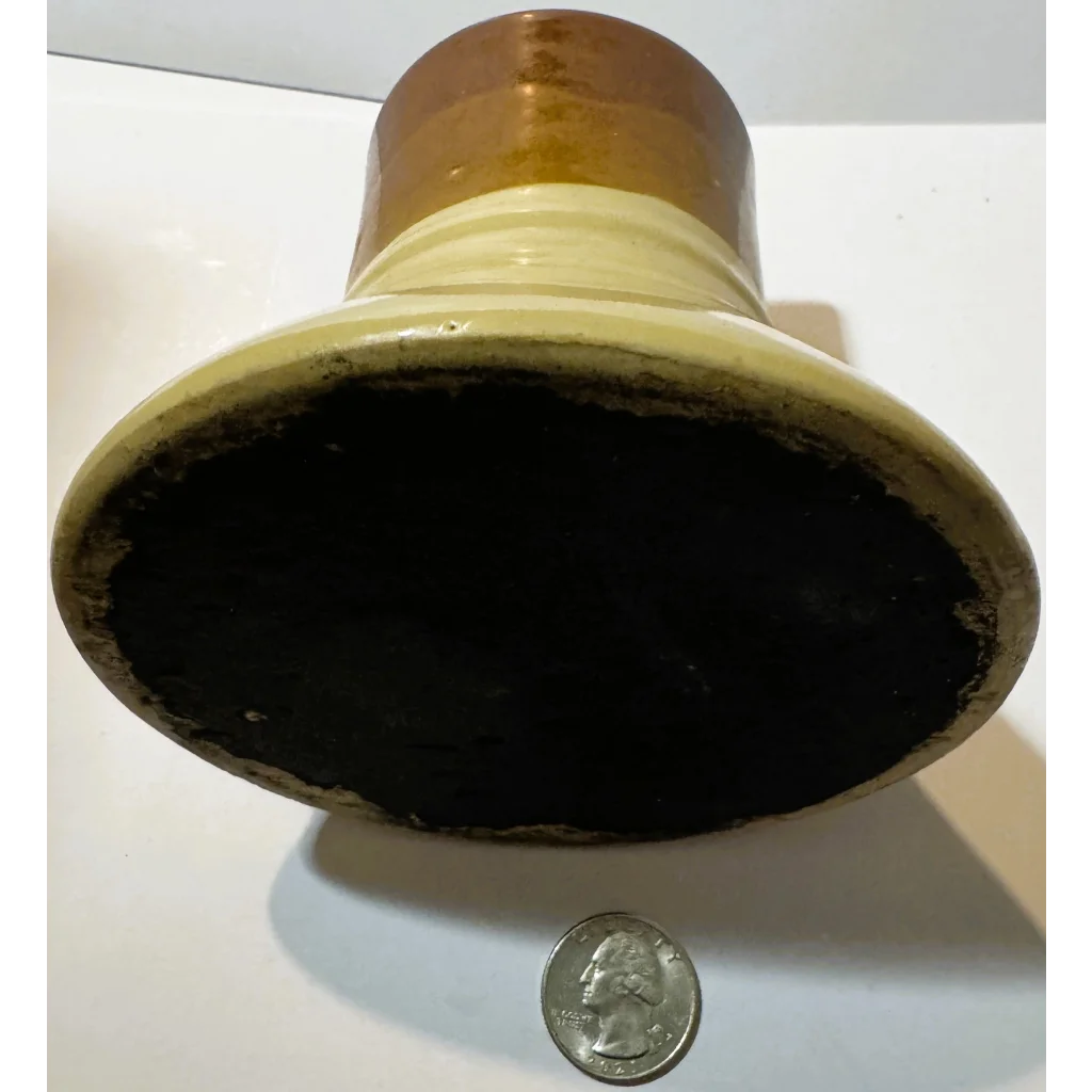 Vintage mid century studio pottery mug with two-tone design and wide base