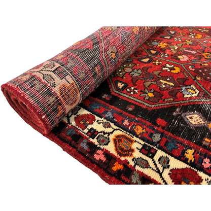 Vintage Persian Hosseinabad runner with red black floral patterns