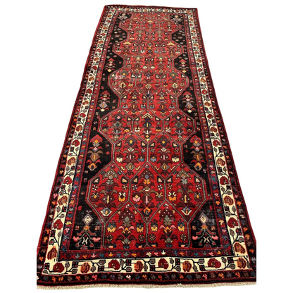 Vintage Persian Hosseinabad runner with red black floral patterns