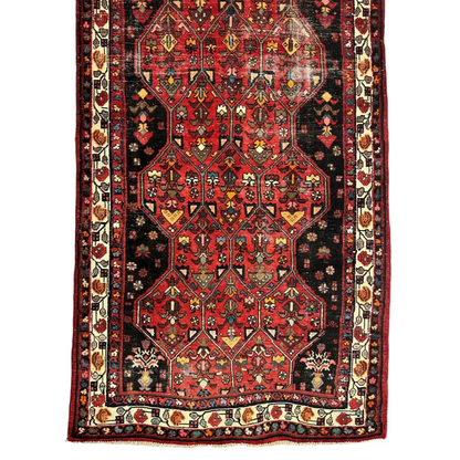 Vintage Persian Hosseinabad runner from 1950s with intricate patterns