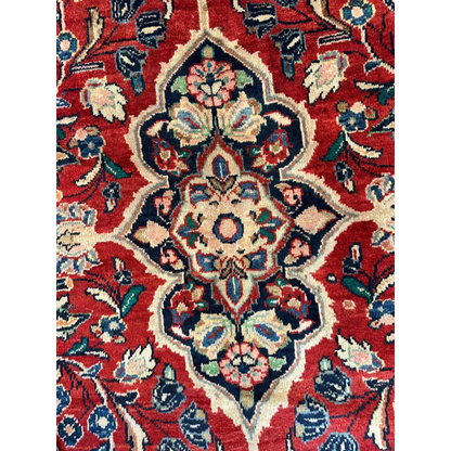 Vintage 1950s Persian Mahal rug with rich red intricate floral patterns