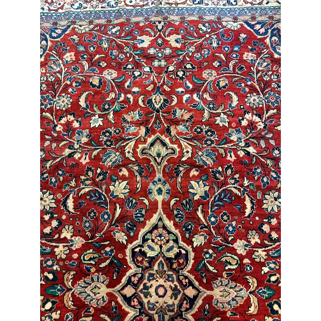 Rich red Persian Mahal rug with 1950s floral patterns in blue, cream, green