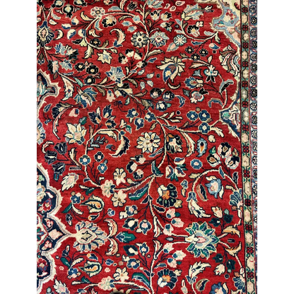 Vibrant red 1950s Persian Mahal rug with intricate floral vine patterns